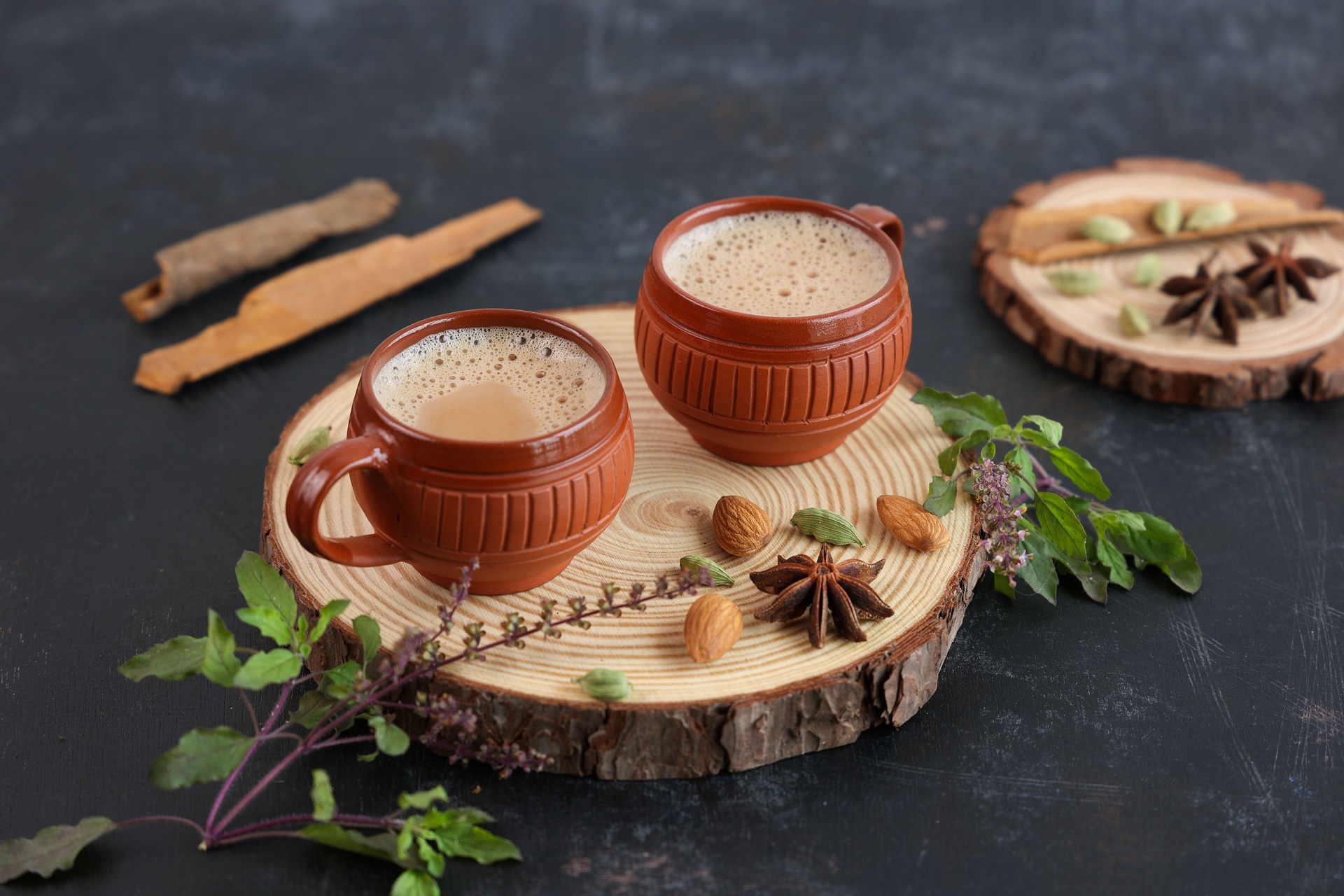 Top view of Indian herbal Masala Chai or traditional beverage tea with milk and spices Kerala India